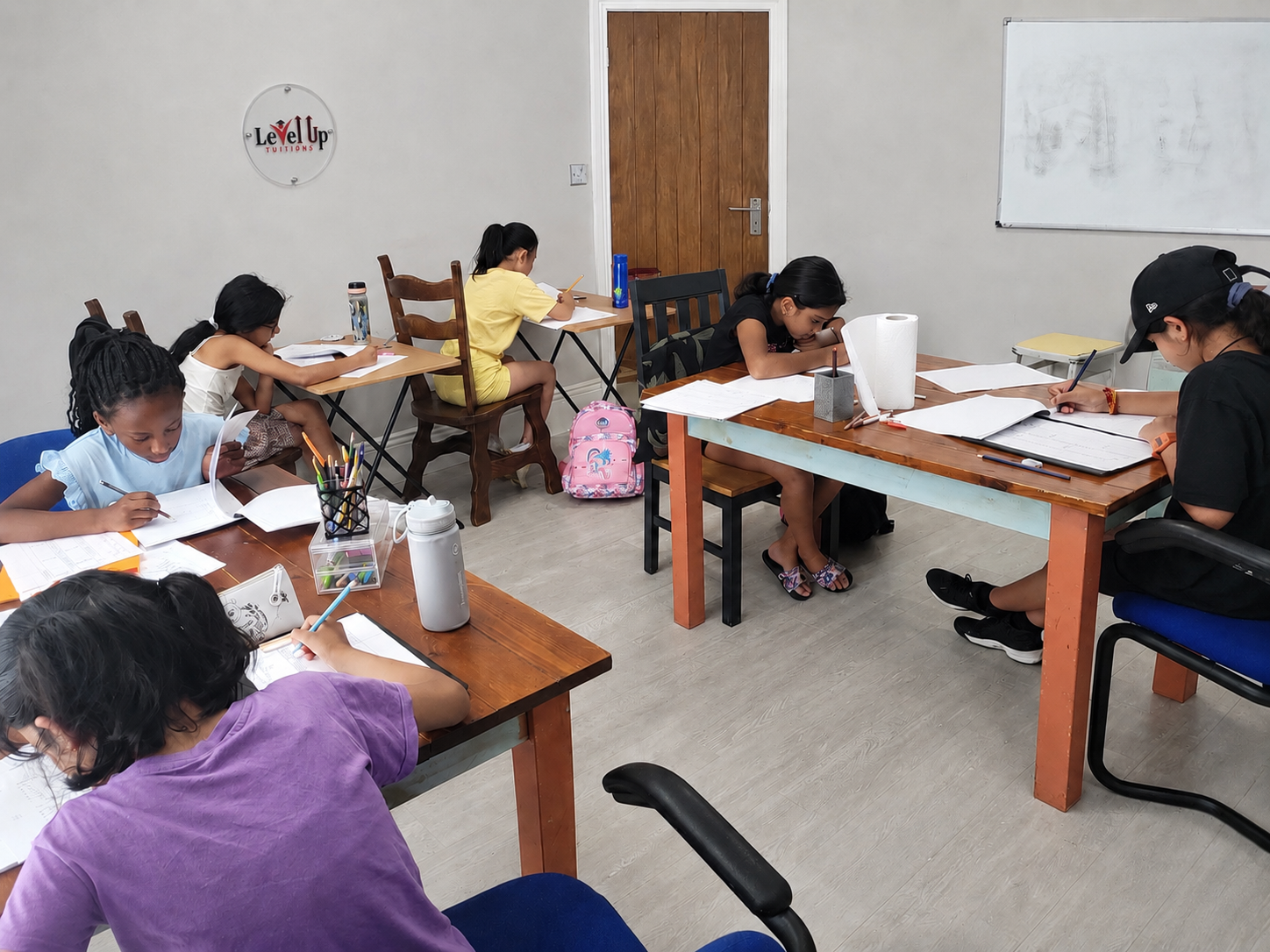 Students working quietly during a Level Up mock test session